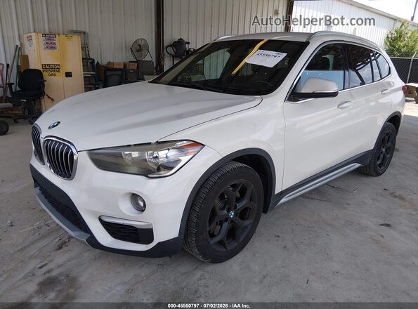WBXHU7C3XJ3F04566 2018 BMW X1 White Front left