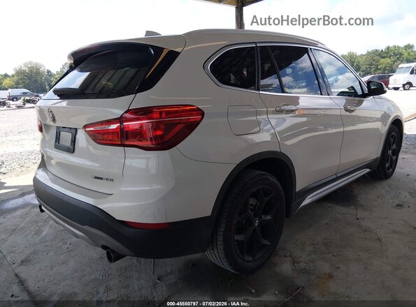 WBXHU7C3XJ3F04566 2018 BMW X1 White Rear right
