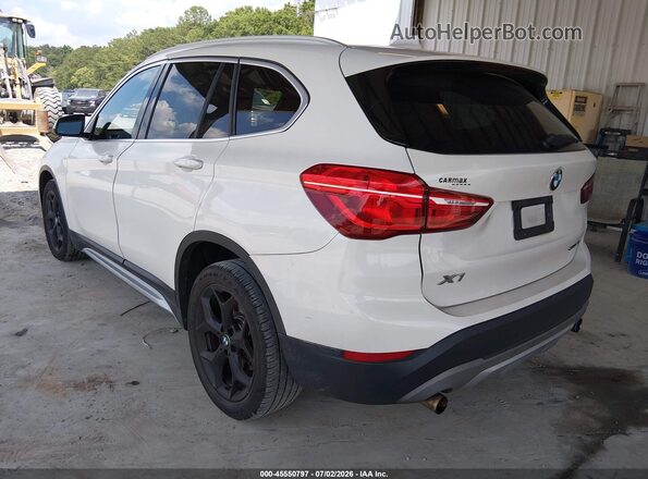 WBXHU7C3XJ3F04566 2018 BMW X1 White Rear left