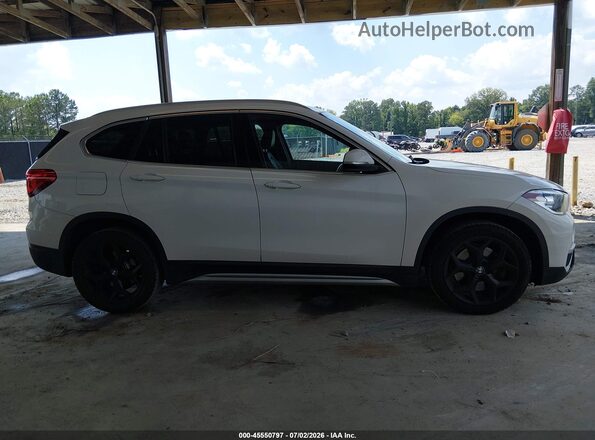 WBXHU7C3XJ3F04566 2018 BMW X1 White Rear interior view