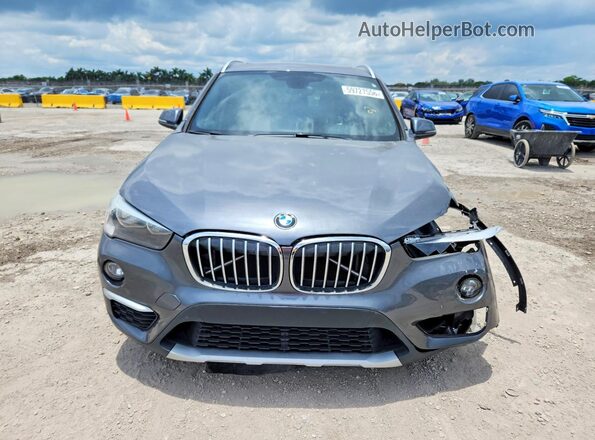 WBXHU7C3XJ5H45838 2018 BMW X1 Gray Vista frontal