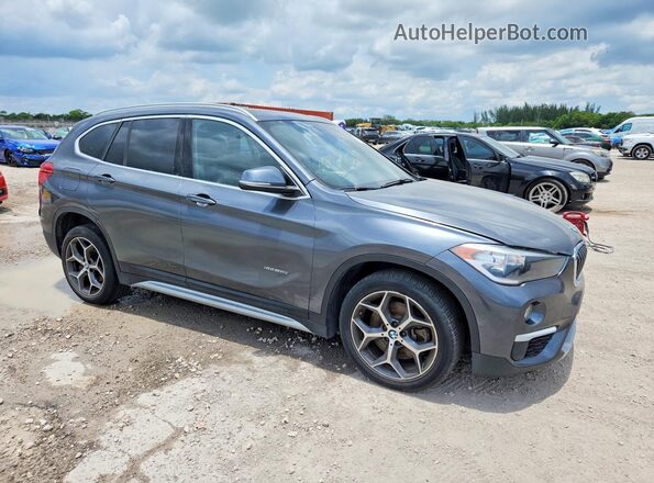 WBXHU7C3XJ5H45838 2018 BMW X1 Gray Delantero derecho