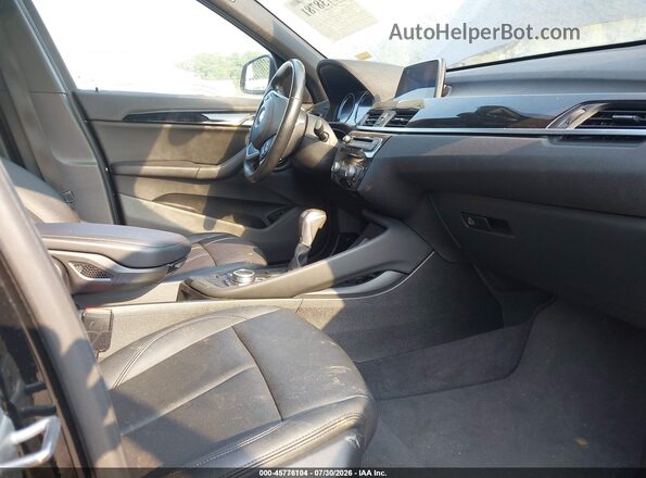 WBXHU7C52K5L10974 2019 BMW X1 Black Սալոնի դիմացի տեսք
