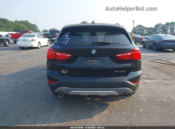 WBXHU7C52K5L10974 2019 BMW X1 Black 