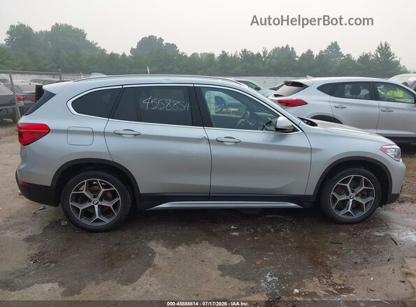 WBXHU7C57K3H45634 2019 BMW X1 Silver Widok wnętrza z tyłu