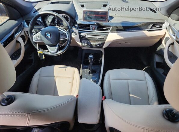 WBXHU7C5XK3H44638 2019 BMW X1 Blue Вид панелі приладів