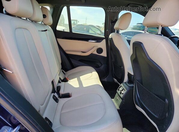 WBXHU7C5XK3H44638 2019 BMW X1 Blue Вид задньої частини салону