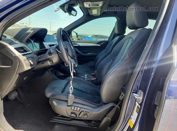 WBXJG7C01L5R91921 2020 BMW X1 Blue Front interior view