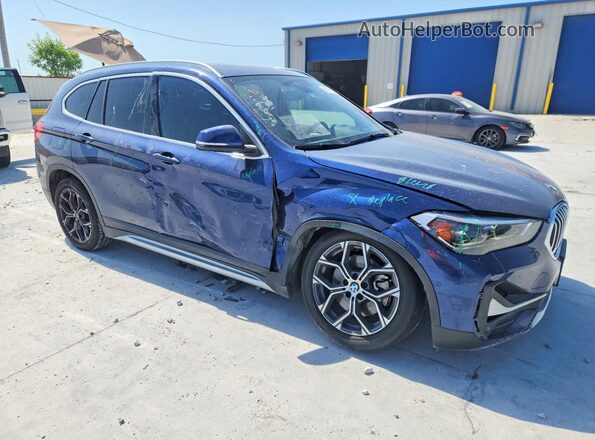 WBXJG7C01L5R91921 2020 BMW X1 Blue Front right