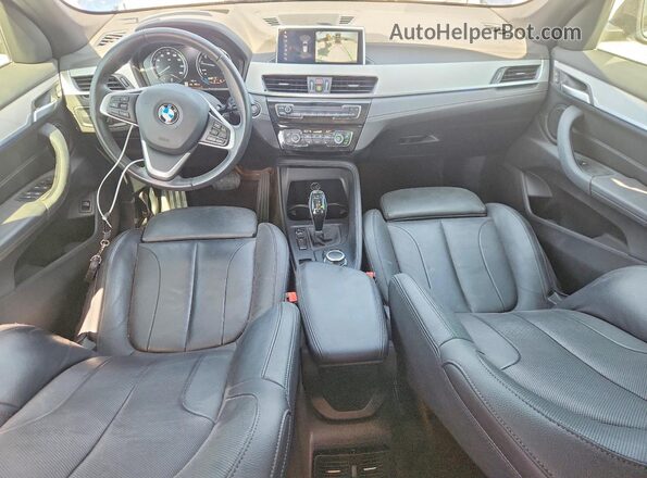WBXJG7C01L5R91921 2020 BMW X1 Blue Dashboard view