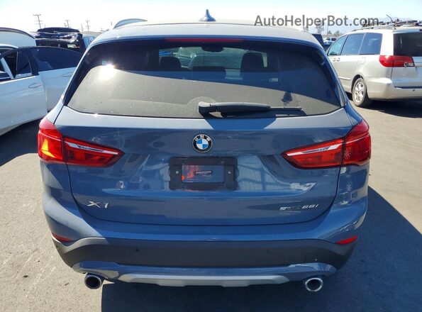 WBXJG7C01M3M74177 2021 BMW X1 Gray Rear view