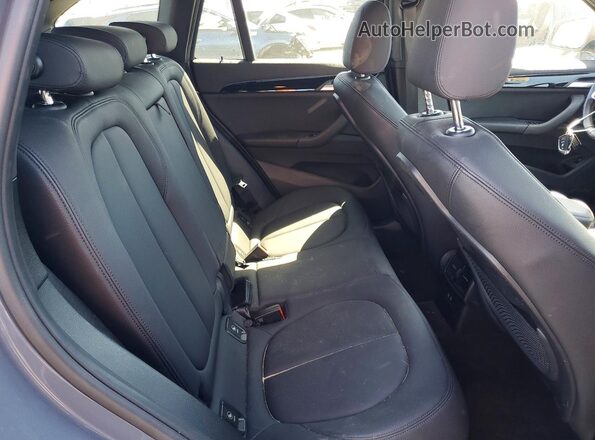 WBXJG7C01M3M74177 2021 BMW X1 Gray Rear interior view