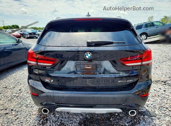 WBXJG7C01M5S77109 2021 BMW X1 Black Հետևի տեսք