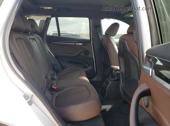 WBXJG7C04L5R63739 2020 BMW X1 White Սալոնի հետևի տեսք
