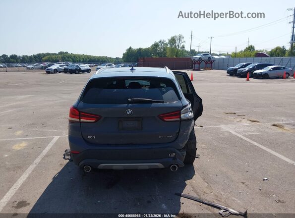 WBXJG7C05M5T10404 2021 BMW X1 Light Blue 