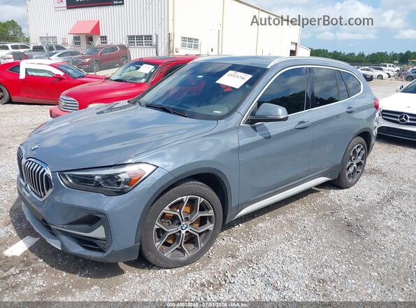 WBXJG7C06L5P25861 2020 BMW X1 Gray Front left