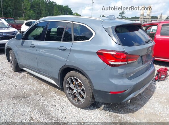 WBXJG7C06L5P25861 2020 BMW X1 Gray Rear left