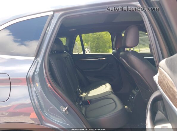 WBXJG7C06L5P25861 2020 BMW X1 Gray VIN sticker view