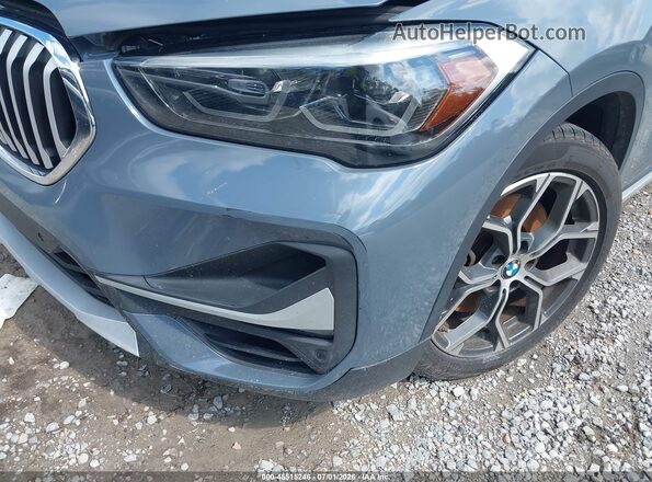 WBXJG7C06L5P25861 2020 BMW X1 Gray Front view