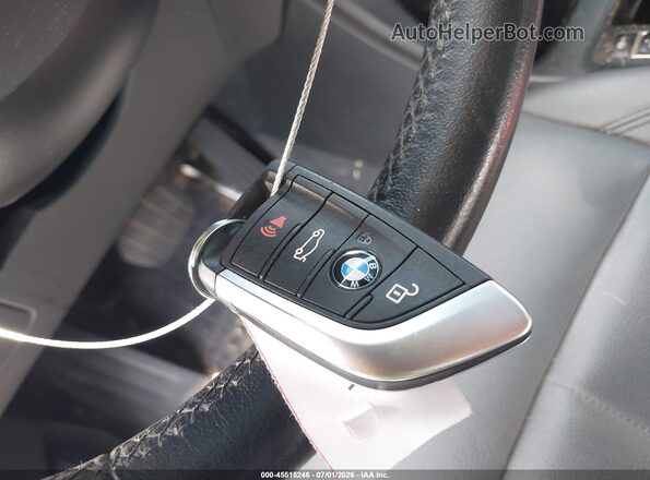 WBXJG7C06L5P25861 2020 BMW X1 Gray Dashboard view