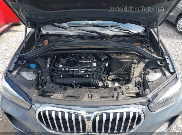 WBXJG7C06L5P25861 2020 BMW X1 Gray Rear view