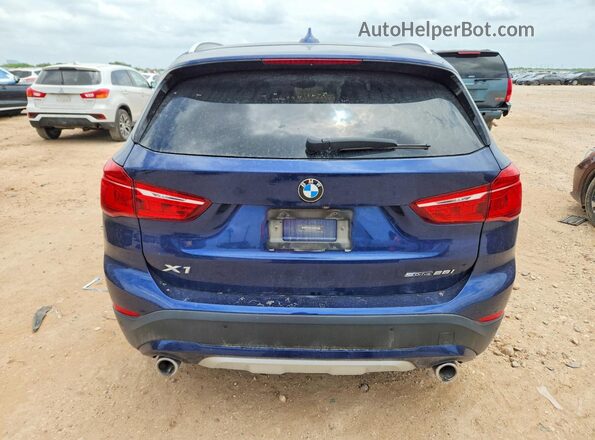 WBXJG7C07L5P29031 2020 BMW X1 Синий Вид сзади