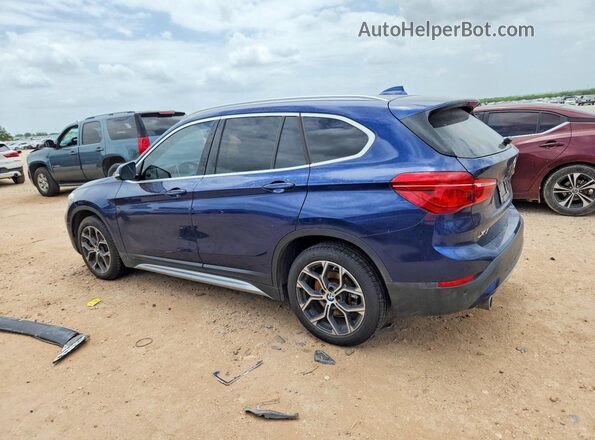 WBXJG7C07L5P29031 2020 BMW X1 Синий Задняя левая четверть