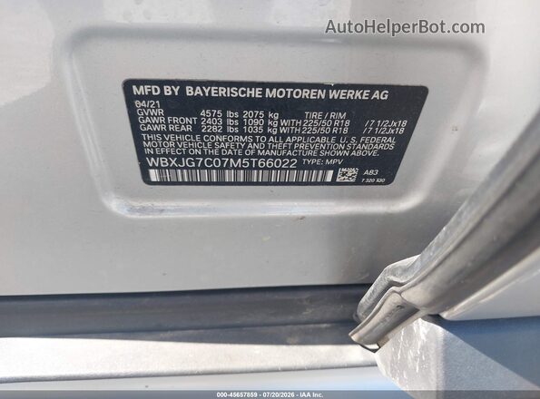 WBXJG7C07M5T66022 2021 BMW X1 Silver Vista del compartimento del motor
