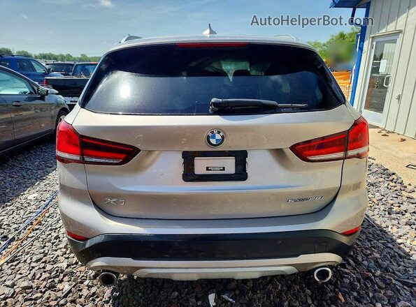 WBXJG7C08M5U37633 2021 BMW X1 Beige Widok z tyłu