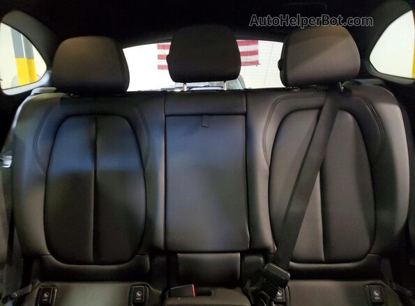 WBXJG9C00L5P74517 2020 BMW X1 Black Rear seats view