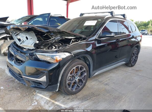 WBXJG9C01L5R28216 2020 BMW X1 Black წინა მარცხენა ხედი სამი მეოთხედიდან