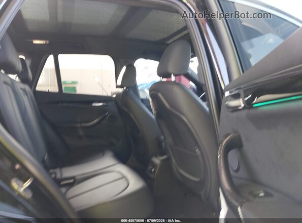 WBXJG9C01L5R28216 2020 BMW X1 Black VIN კოდის სტიკერის ხედი
