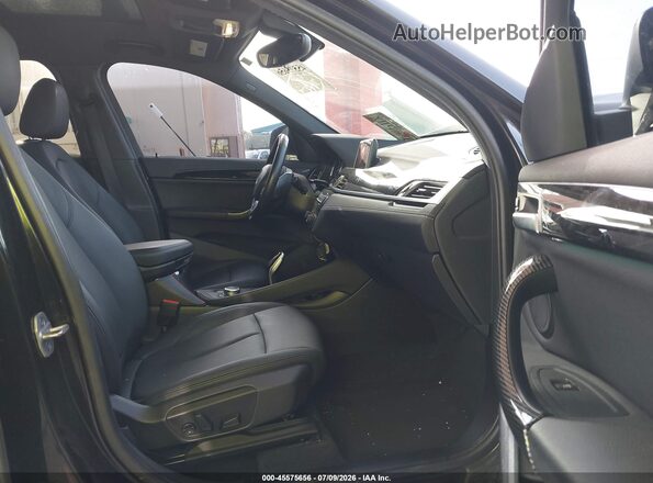 WBXJG9C01L5R28216 2020 BMW X1 Black წინა სალონის ხედი