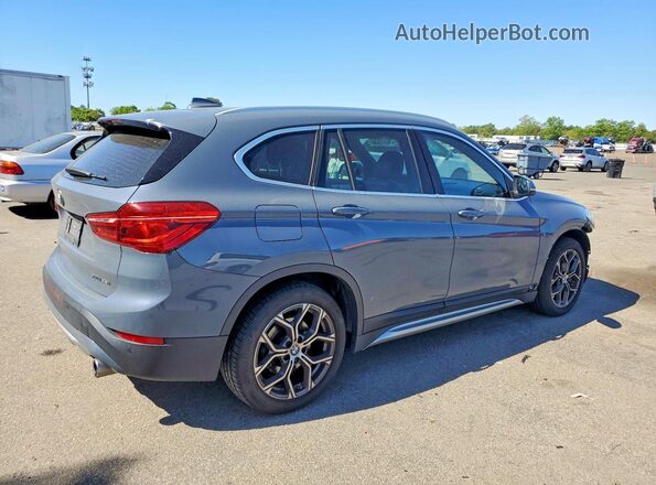 WBXJG9C01M5S29430 2021 BMW X1 Gray Rear right