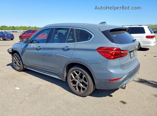 WBXJG9C01M5S29430 2021 BMW X1 Gray Rear left