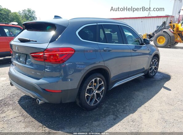 WBXJG9C01M5T62270 2021 BMW X1 Light Blue Trasero derecho