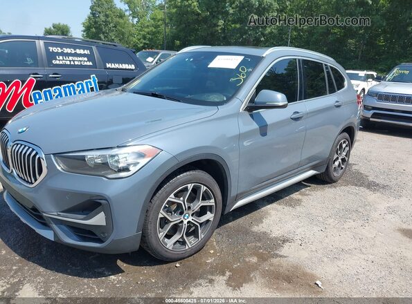 WBXJG9C01M5T62270 2021 BMW X1 Light Blue Vista tres cuartos delantera izquierda