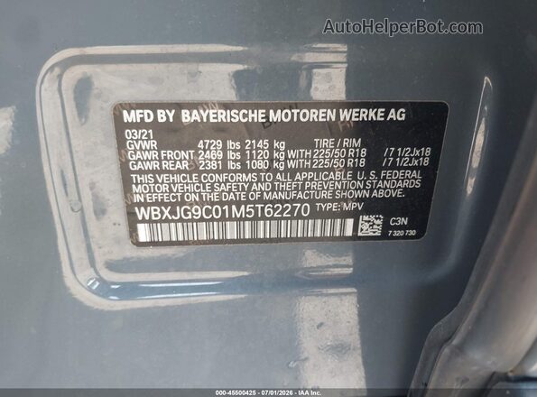 WBXJG9C01M5T62270 2021 BMW X1 Light Blue Vista del compartimento del motor