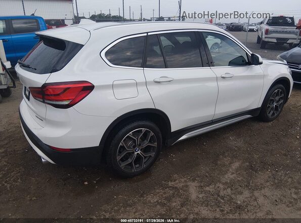WBXJG9C05L3L87585 2020 BMW X1 White Trasero derecho