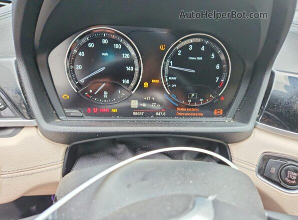 WBXJG9C06L5P62713 2020 BMW X1 Blue ხელსაწყოთა პანელის ხედი