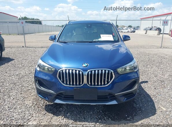 WBXJG9C06M5S10002 2021 BMW X1 Blue ხელსაწყოთა პანელის ხედი