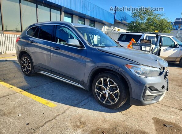 WBXJG9C07M3M76687 2021 BMW X1 Серый Передняя правая четверть