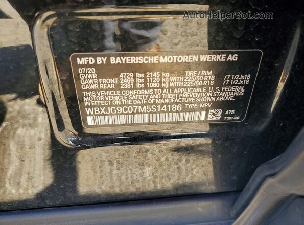 WBXJG9C07M5S14186 2021 BMW X1 Black Вид наклейки з VIN-кодом