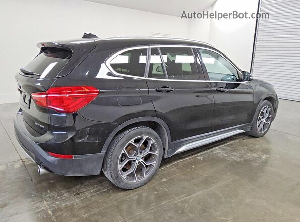 WBXJG9C08L5P87340 2020 BMW X1 Black Trasero derecho