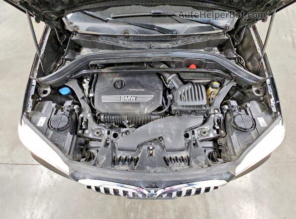 WBXJG9C08L5P87340 2020 BMW X1 Black Vista del compartimento del motor