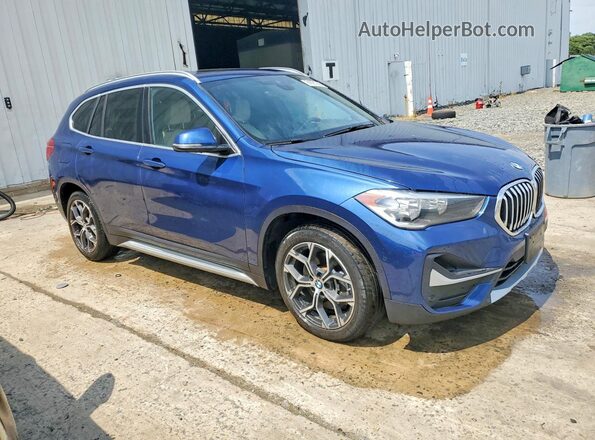 WBXJG9C0XM5T68911 2021 BMW X1 Blue Przód prawy