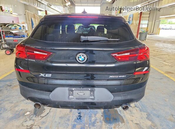 WBXYJ1C04M5S53397 2021 BMW X2 Black Vista trasera