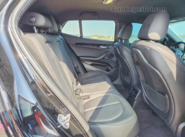 WBXYJ1C07M5S27280 2021 BMW X2 Black Вид задньої частини салону