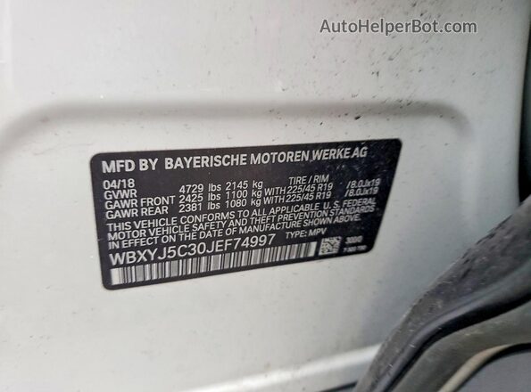 WBXYJ5C30JEF74997 2018 BMW X2 White Vista de la etiqueta del VIN