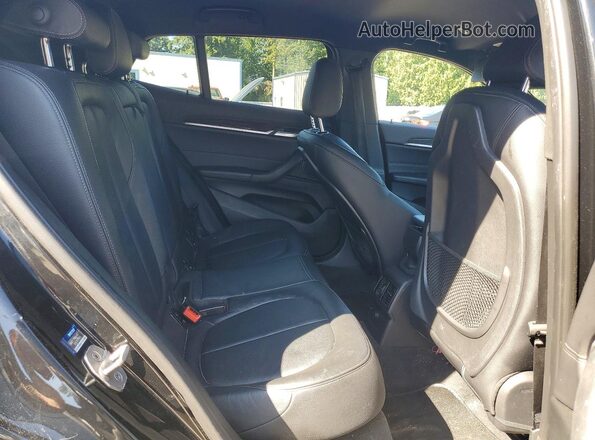 WBXYJ5C34JEF77286 2018 BMW X2 Black Սալոնի հետևի տեսք